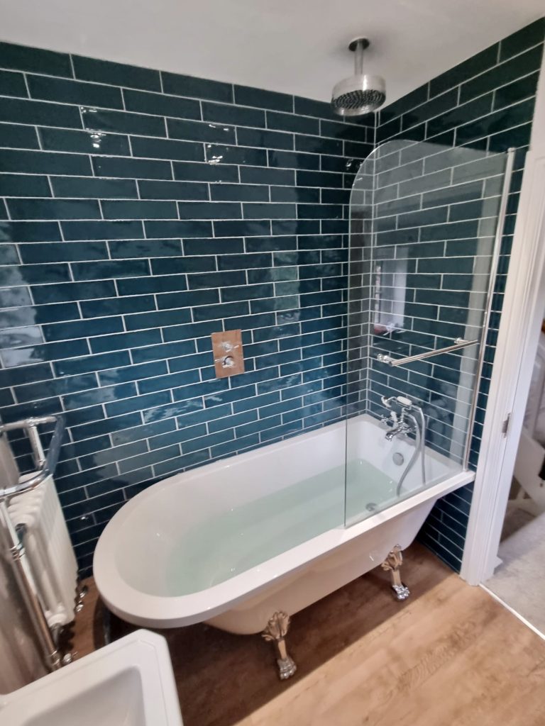Traditional Bathroom Fitting, roll top bath green tiling